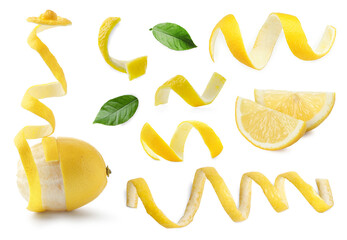 Fresh lemons, peels and green leaves on white background