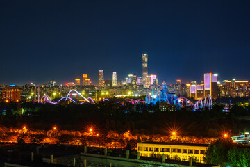 Obraz premium Night view of the skyline of Beijing CBD area at sunset