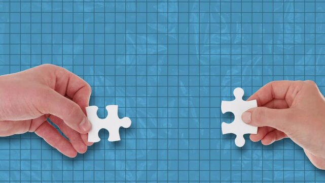 4K Photo Collage Animation of Hand Finger holding puzzle piece trying to connect with another, in blue square grid lines background