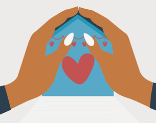 Two hands form a roof over a blue house with a heart inside. Single mother protects her house and children. Concept that shows love, care, safety, family support, and protection in the home. 