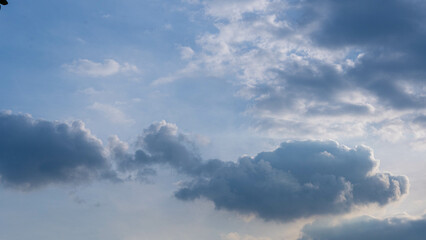 Beautiful sunset time lapse in orange sky with fluffy clouds. Warm romantic sky and clouds at sunrise. winter sky.