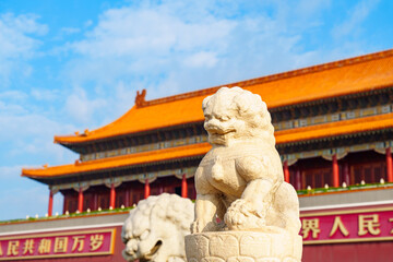 Fototapeta premium Stone lion before Tian'anmen under blue sky in Beijing, China