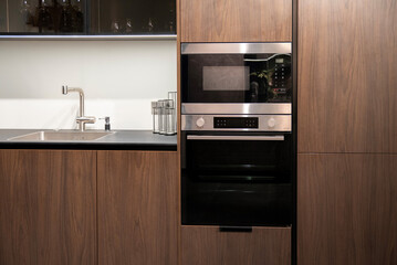 Built-in microwave and oven with touch controls and stainless finish