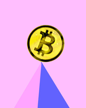 Bitcoin balancing on triangle against pink background