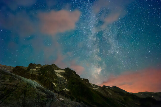 Scenic view of Milky Way above Aiguille de Midi mountain at night