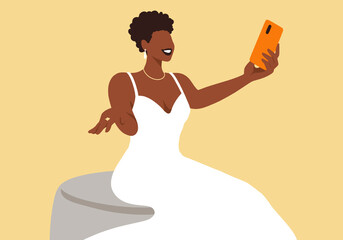 Smiling bride taking selfie through smart phone against colored background