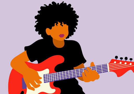 Boy playing electric guitar against colored background