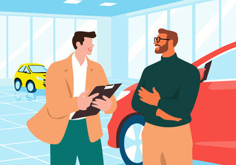 Salesman talking with customer standing near car in showroom