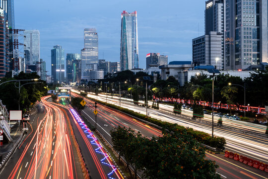 Jakarta, Indonesia: Long exposure of traffic in the heart of Jakarta business and financial district in Indonesia capital city at dusk.