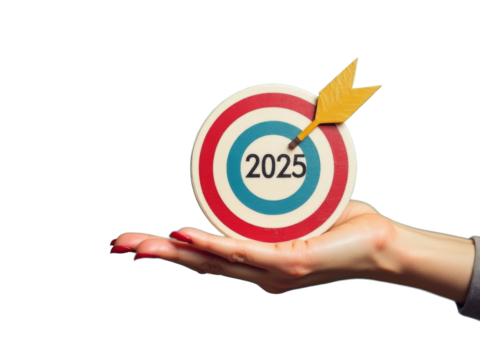 Hand holding target with arrow, symbolizing goals for 2025. This represents ambition, focus, and future planning