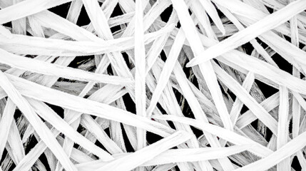 Frozen grass blades covered in ice forming intricate patterns