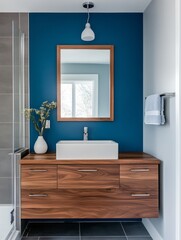 Modern Bathroom Vanity with Teal Wall and Wood Cabinets
