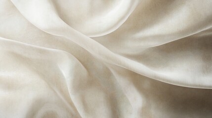 Obraz premium Soft, flowing, ivory silk fabric drapes elegantly.