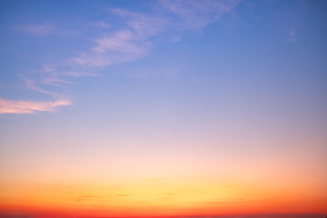 Sky,sunset, beautiful , luxury soft gradient orange gold clouds and sunlight on the blue sky perfect for the background, Sunrise on morning or everning in winter warm time ,Twilight summer,silhouette
