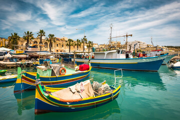 Obraz premium fishing boats near fishing village of Marsaxlokk (Marsascala) in Malta