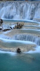 Long explosure Tat Kuang Si waterfall famous place in Luang Prabang, Laos