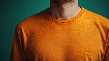 Man's orange shirt, close-up texture.