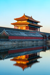 Gate of Divine Prowess of the Forbidden City under blue sky in morning sunlight