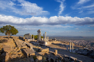 Columns of white marble on the remains of the ruins of the ancient temple of Troyan. The ancient city of Pergamon. Tourist attraction of Turkey.