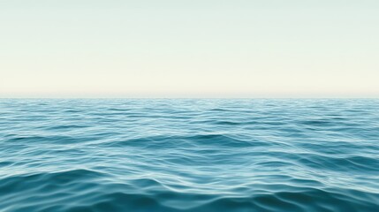 Obraz premium Tranquil seascape with gentle waves and clear skies perfect for travel and vacation themed backgrounds or promotional materials