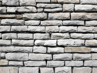 Background of unshape stone or rock wall.