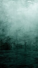 Obraz premium A misty, tranquil scene with a reflective water surface and soft, muted colors.