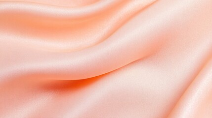 Obraz premium Smooth and Elegant Peach Satin Fabric with Gentle Waves and Texture Details