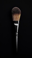 Makeup brush on a black background