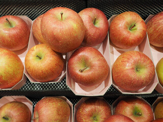 Fresh apples from Aomori Prefecture in Japan in a Japanese supermarket.