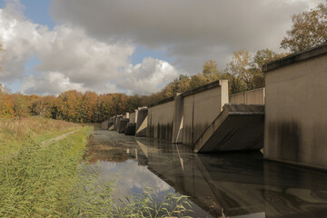 Deltagoot in Waterloopbos. Concrete art in forest. Previously used to test the way water reacts to...