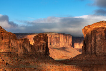 Hunts Mesa in Monument Valley during dusk shows an untouched part of Arizona from high atop the cliffside.