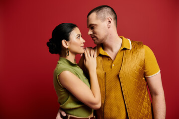 A beautiful young couple in fashionable attire shares intimate moments together, celebrating love.