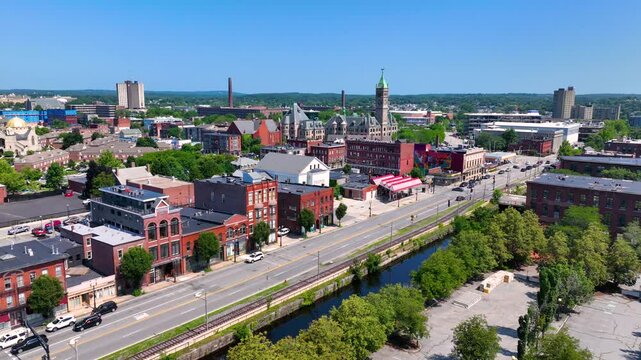 Lowell City Hall and Historic waterfront building on Dutton Street at Upper Pawtucket Canal aerial view in historic city center of Lowell, Massachusetts MA, USA.