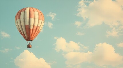 Fototapeta premium Brightly Colored Hot Air Balloon Floating in a Clear Sky with Soft, Fluffy Clouds Enhancing the Tranquil Atmosphere of a Perfect Day for Adventure and Exploration