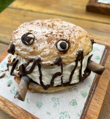Creative Monster Donut Delight on Wooden Tabletop