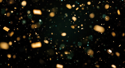 Confetti falls gracefully through the air during a festive celebration at night. Metallic confetti floats against a dark background, creating a vibrant atmosphere during a nighttime celebration