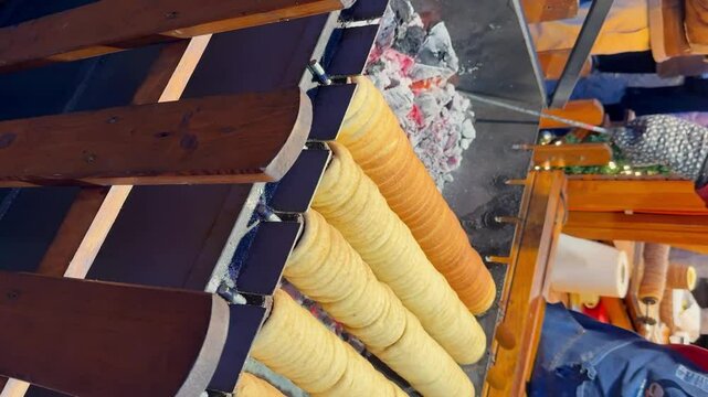 Making a traditional Hungarian Chimney Cake kurtosh kalach. Vertical video