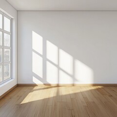 Bright, empty room with wooden floor and sunlight casting shadows from large window.