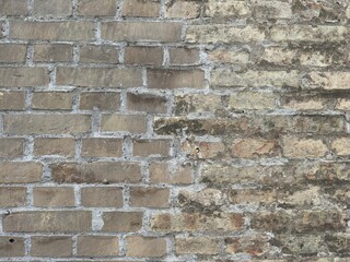 Fototapeta premium antique brick wall background, ancient brick surface
