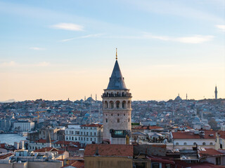 Fototapeta premium Galata Tower (Galata Kulesi) in the Sunset Photo, Galata Beyoglu, Istanbul Turkiye (Turkey)