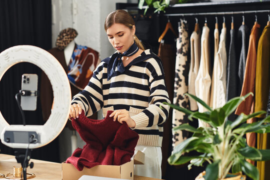 Chic stylist curates trendy outfits in a stylish space, sharing fashion ideas online.