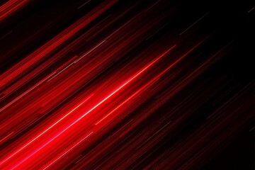 Abstract red light streaks diagonally over black background.
