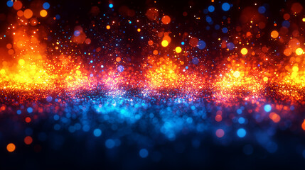 Obraz premium A beautiful, abstract scene of glowing particles in red, orange, and blue hues.