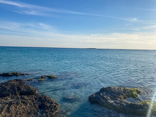 Evening sunset on the seashore. Stones on the seashore