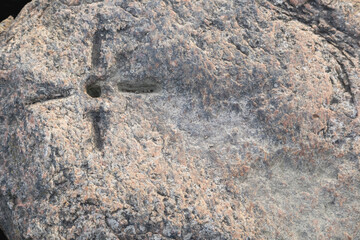a stone with an incised texture