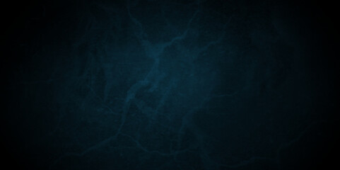 Dark Blue background with grunge backdrop texture, watercolor painted mottled blue background, colorful bright ink and watercolor textures on black paper background.