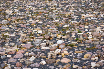 small and round stones on the beach