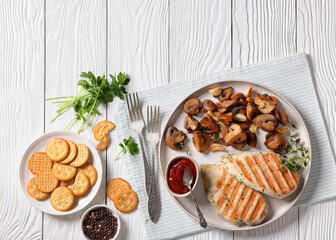 grilled chicken breasts with mushrooms, top view