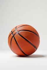 Fototapeta premium Single basketball, pristine white background, studio shot, detail shot, recreation, isolated basketball