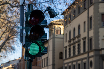 Green traffic light in a city of Rome, Italy
